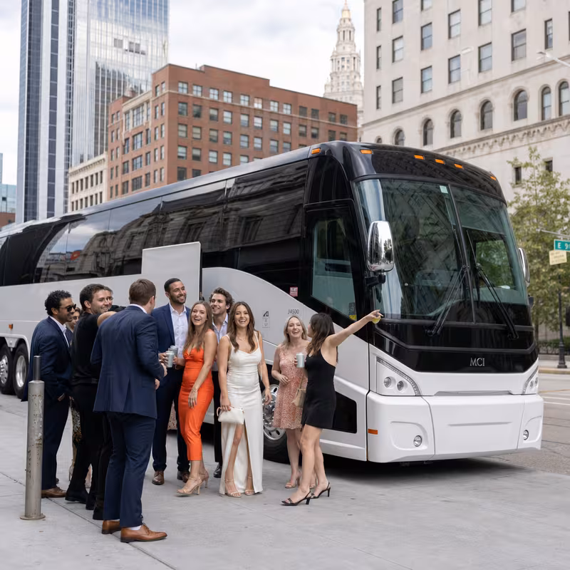 Passengers loading luggage while boarding an Cleveland group shuttle