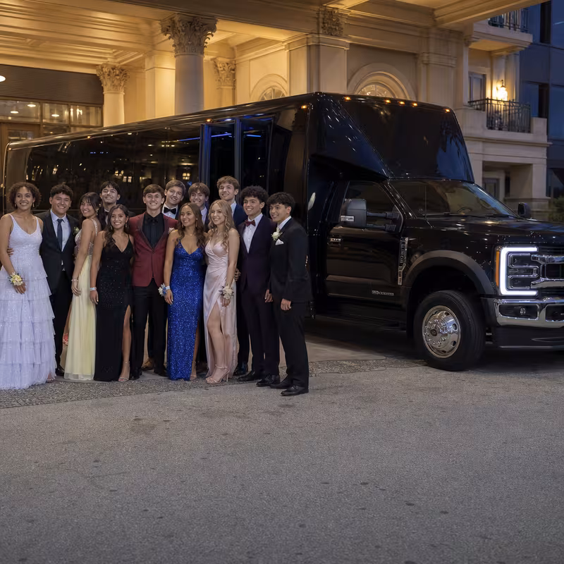 Party bus interior with wraparound leather seating and LED lighting in Cleveland